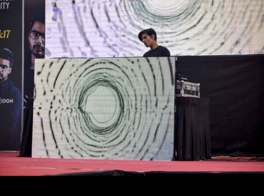 DJ Palash performing at Noida International University